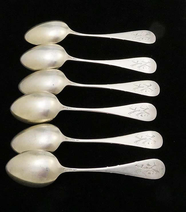 reverse of Whiting sterling silver coffee spoons with applied ivy